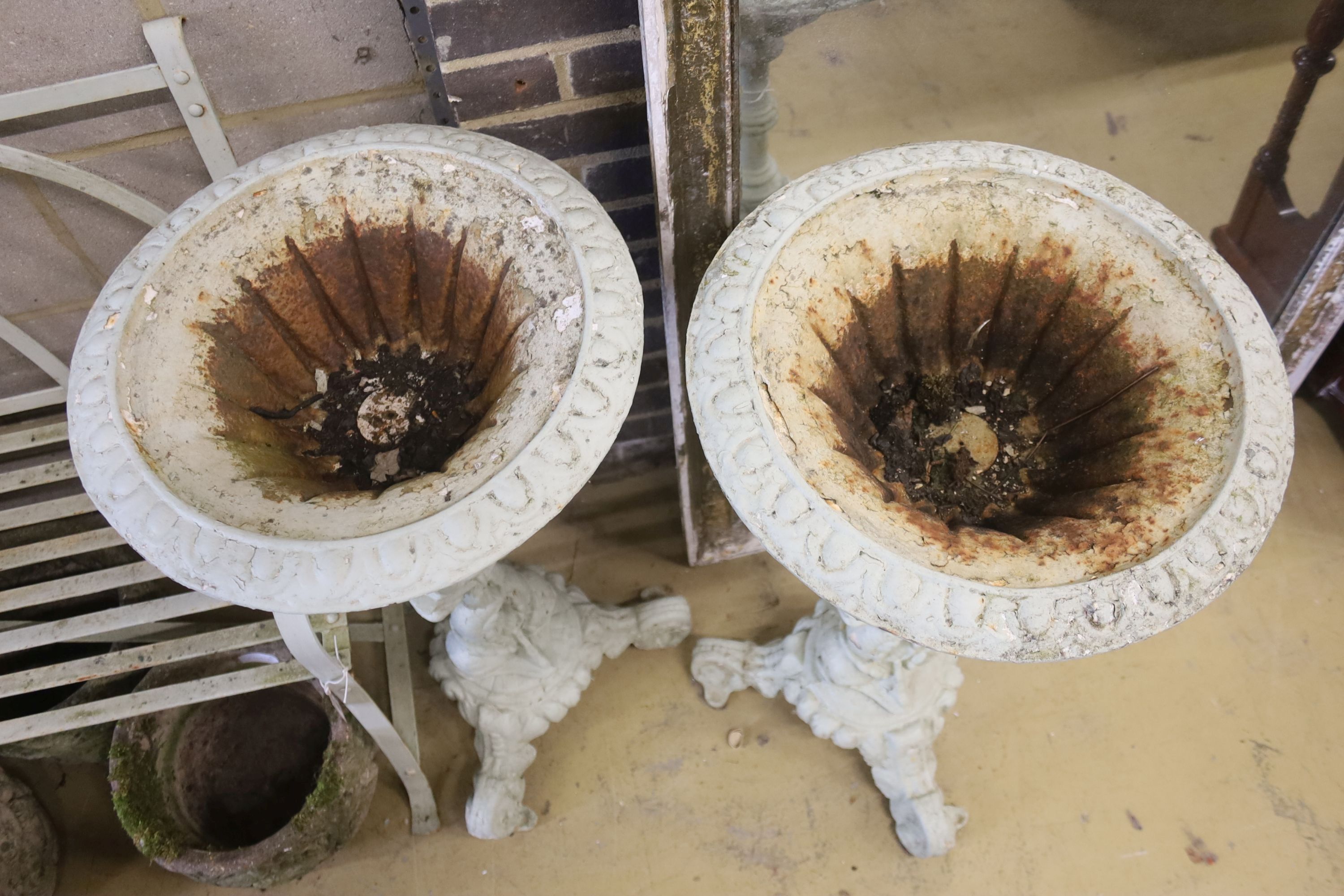 A pair of Victorian Coalbrookdale style painted cast iron pedestal urns, diameter 46cm, height 84cm